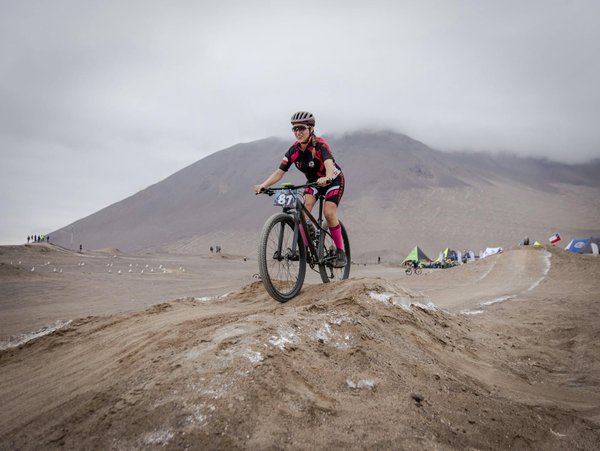 How can rock climbers prevent tendon injuries during intense training?